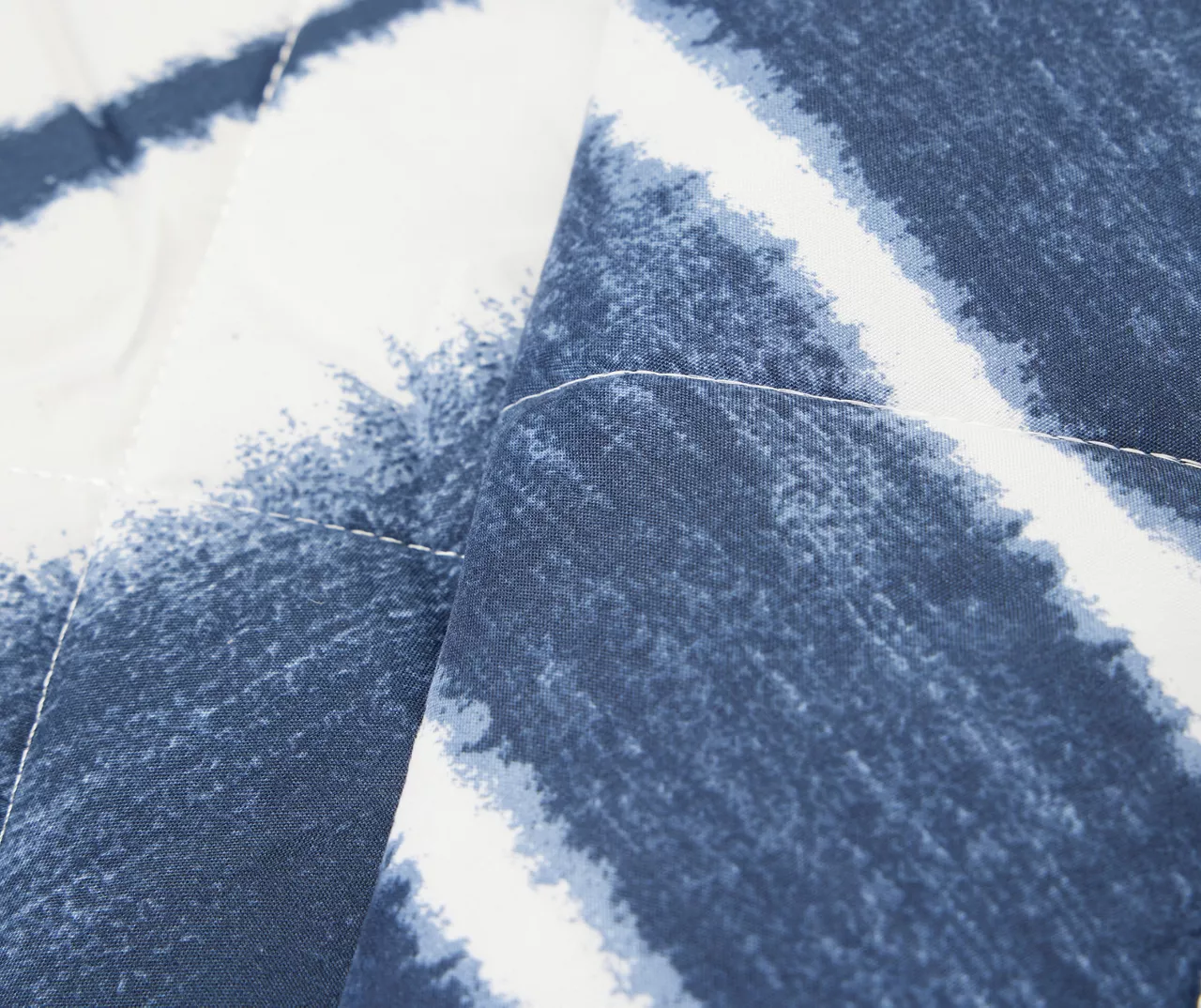 Real Living Grecian Getaway Navy & White Tie-Dye Stripe Reversible Microfiber Quilt 6 Real Living Grecian Getaway Navy & White Tie-Dye Stripe Reversible Microfiber Quilt - Image 4